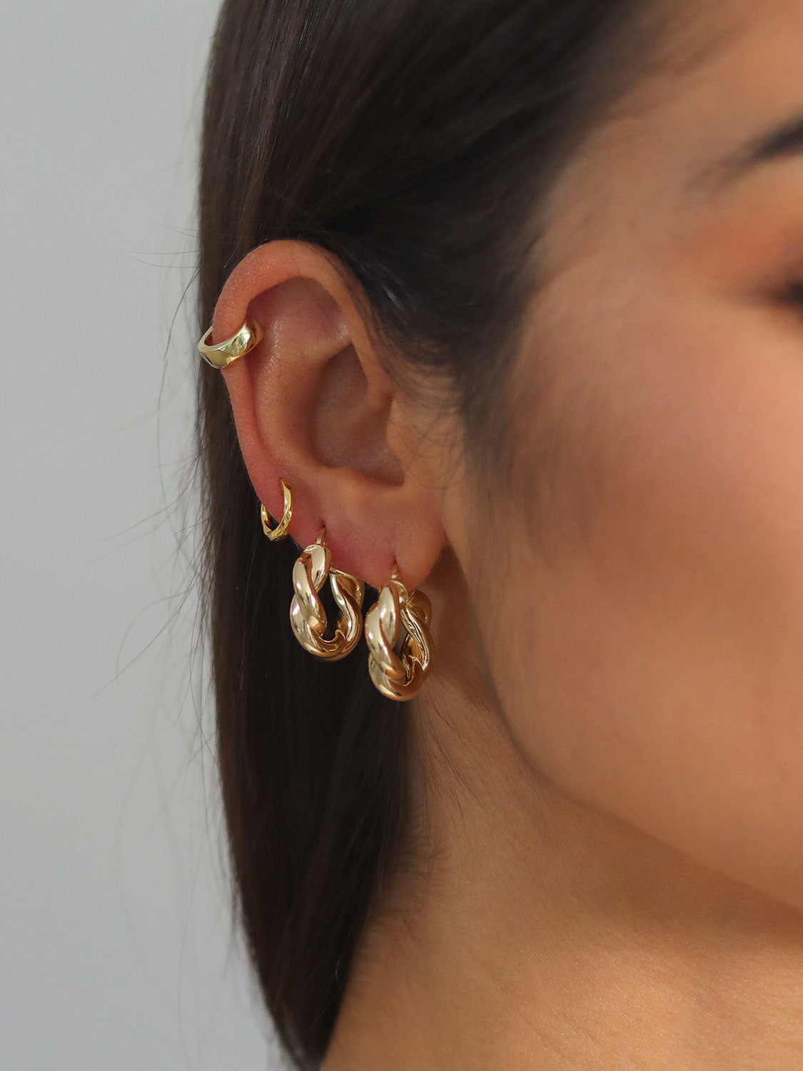 Brincos Twisted Hoops